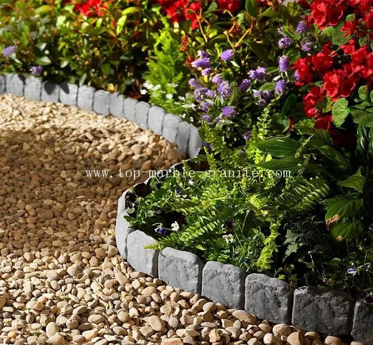 Pebbles on the edge of the flowerbed